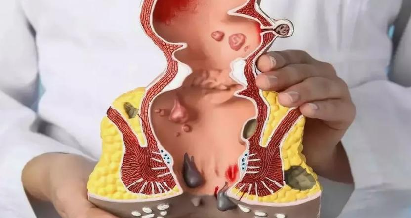 Person reading health information at a desk with a cup of tea
